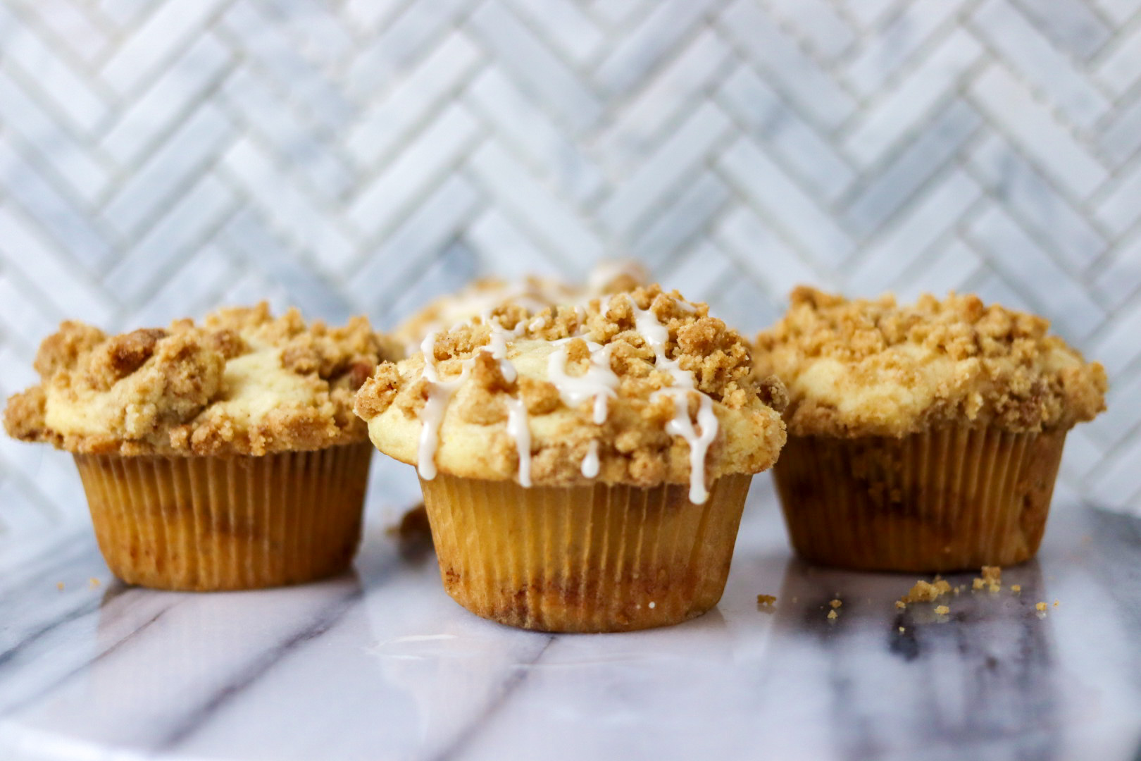 light & fluffy cinnamon swirl muffins with easy vanilla glaze